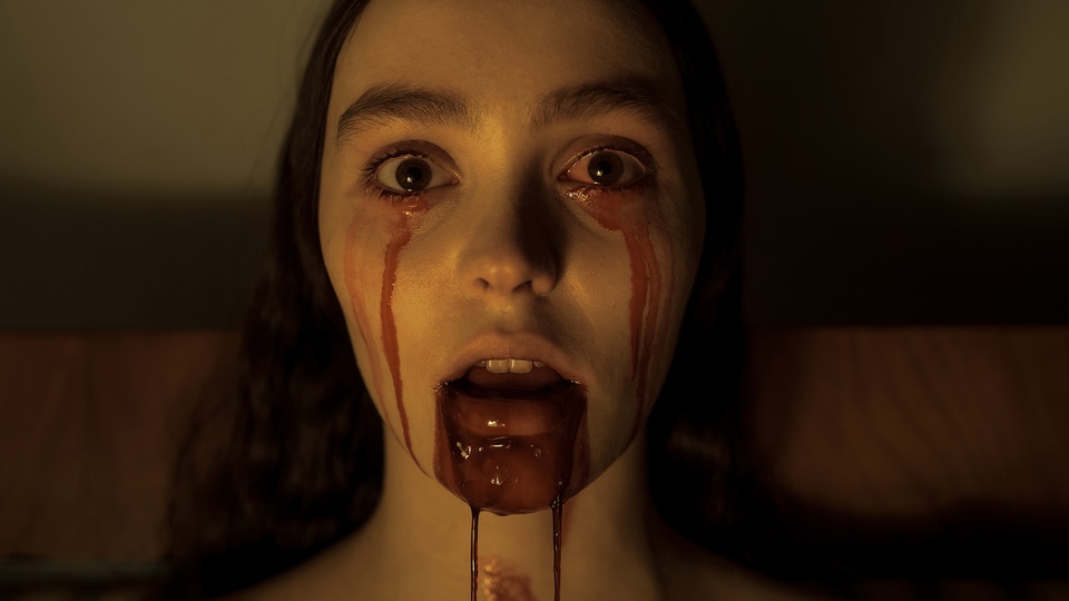 Ellen Hutter (Lily-Rose Depp) bleeds from her eyes and mouth in Nosferatu (2024).