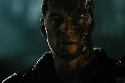Marcus Wright (Sam Worthington) with half his face melting off with a robotic underlayer in Terminator: Salvation (2009).