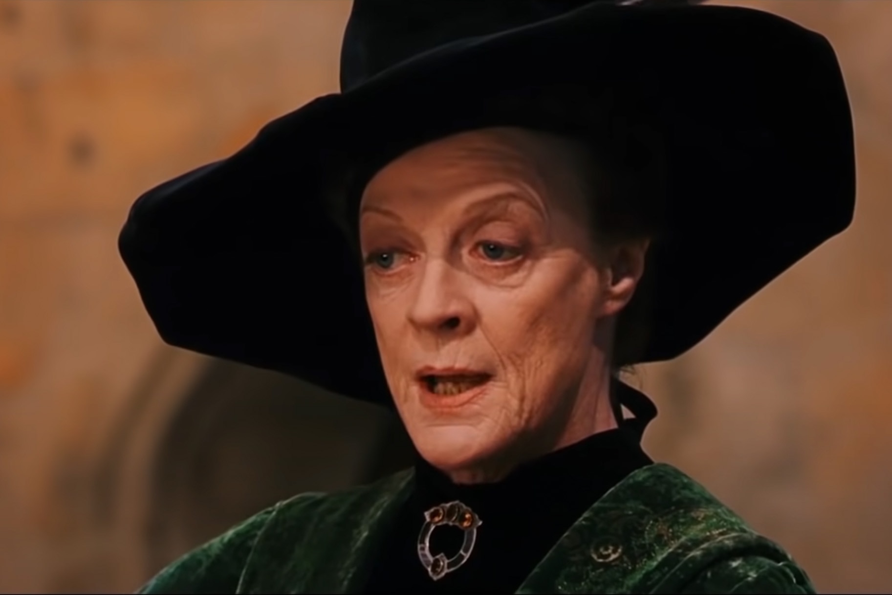 Professor McGonagall (Maggie Smith) wears a witch hat in Harry Potter and the Philosopher's Stone (2001).