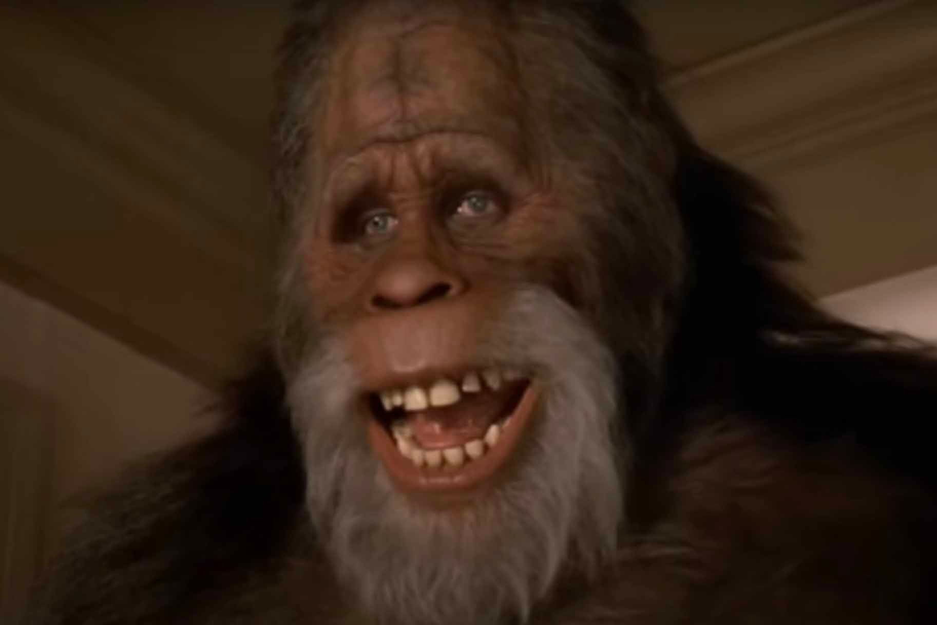 Harry (Kevin Peter Hall) smiles in Harry and the Hendersons (1987).