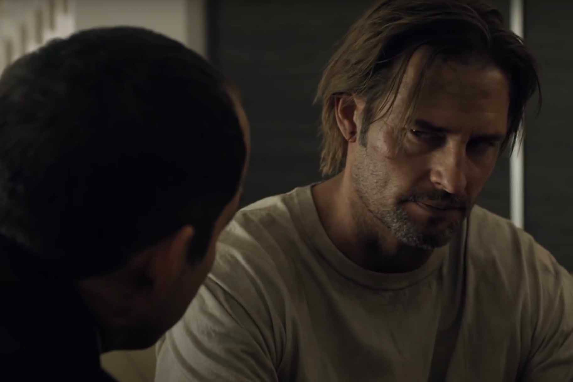 Will Bowman (Josh Holloway) looks suspiciously at a man in Colony Season 1.