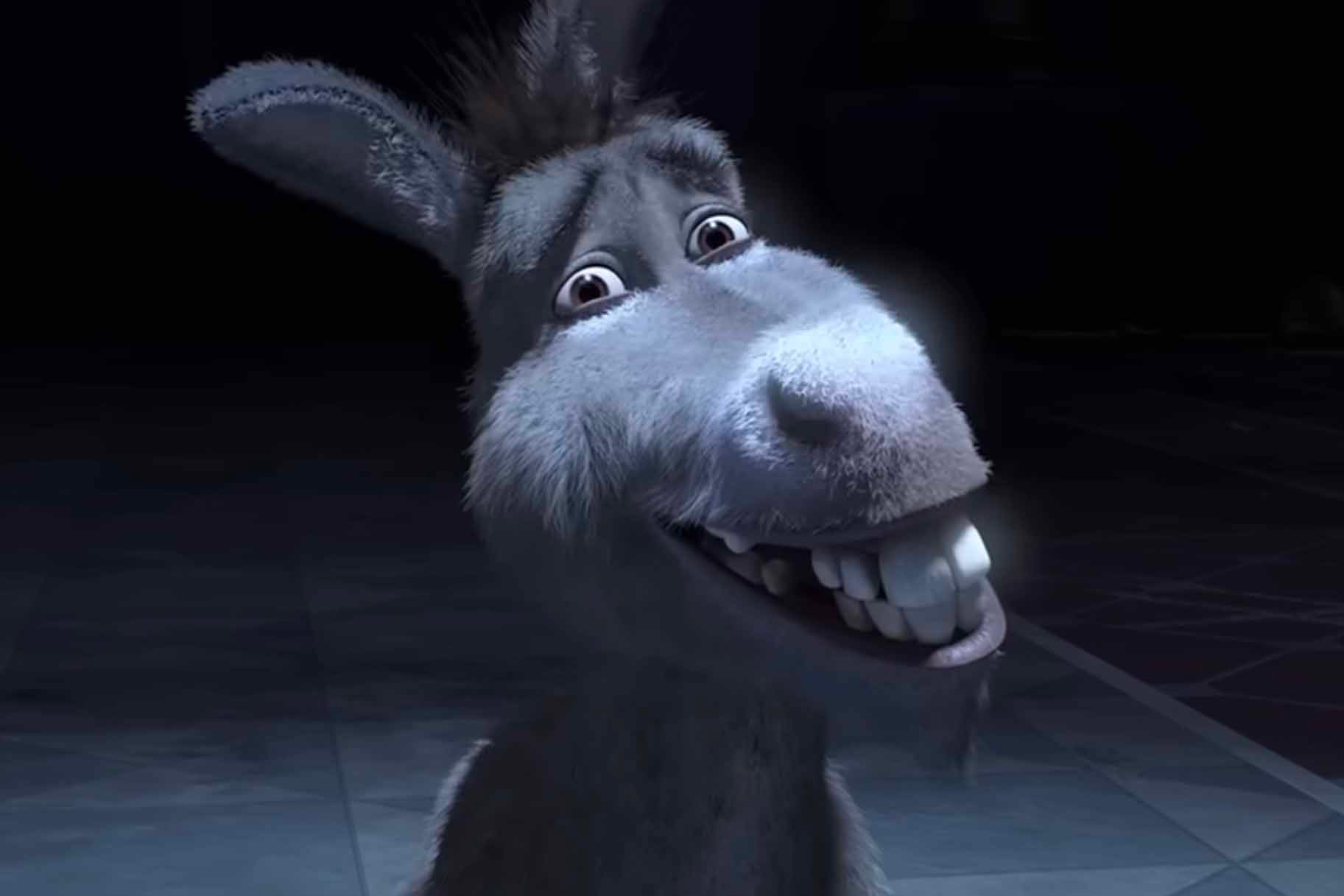 Donkey (Eddie Murphy) smiles painfully in Shrek Forever After (2010).