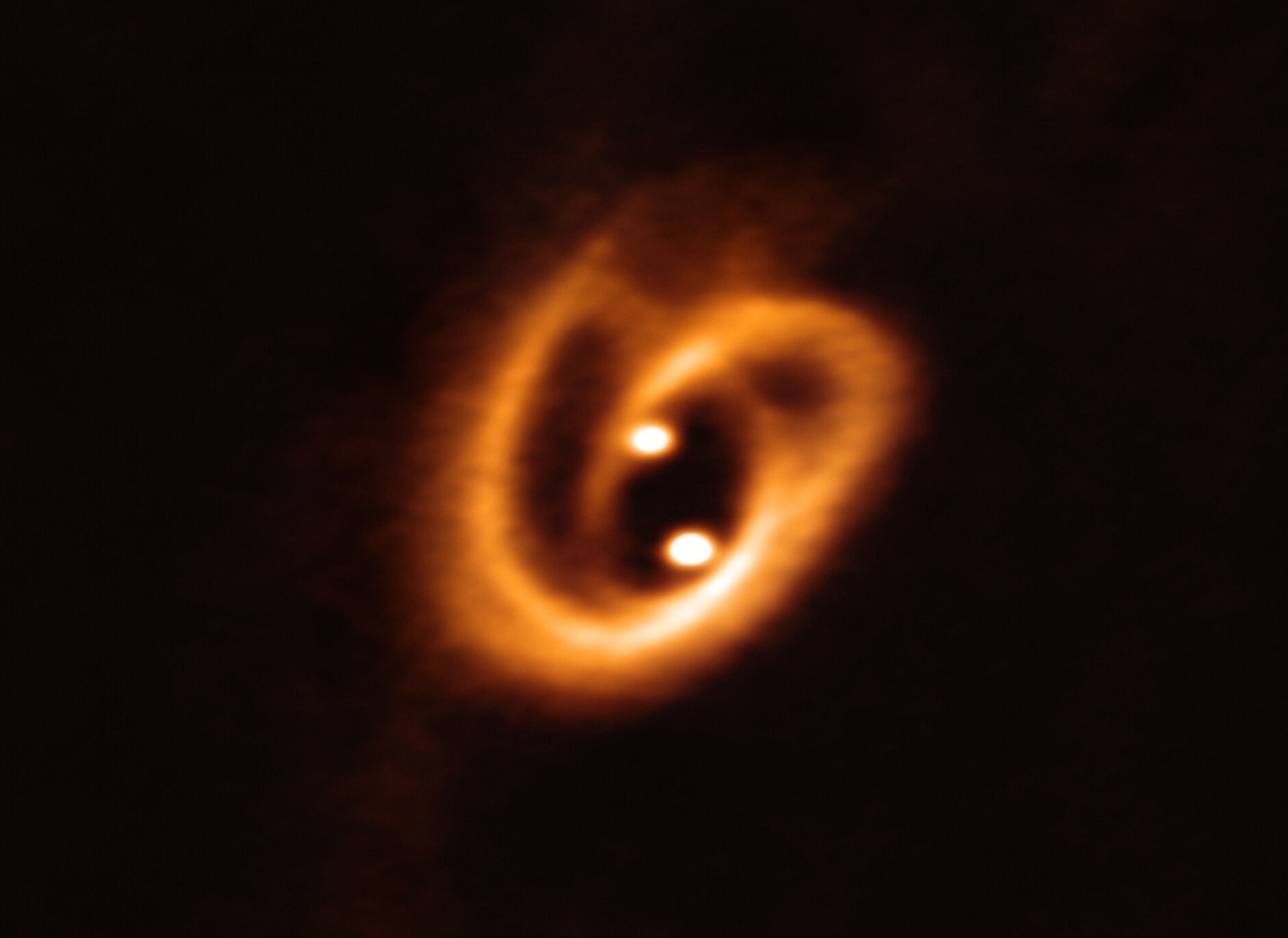 Bad Astronomy ALMA Sees The Twisted Birth Of A Binary Star System 