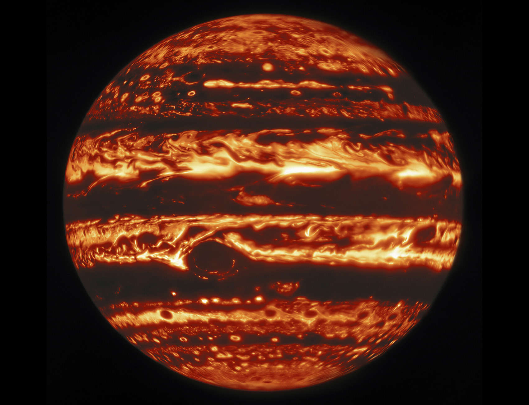 Jupiter in infrared by the Gemini Observatory, showing warmer areas as brighter and cooler darker. Credit: International Gemini Observatory/NOIRLab/NSF/AURA, M.H. Wong (UC Berkeley) et al. Acknowledgments: M. Zamani