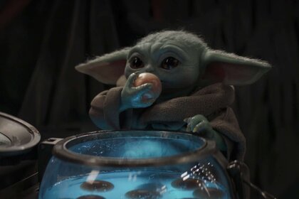 Baby Yoda eating eggs in The Mandalorian