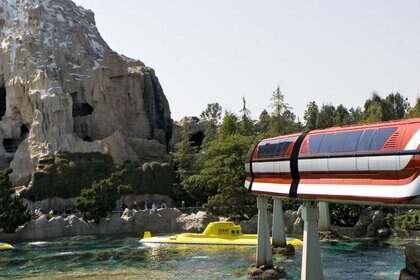 Disneyland's Monorail passing by Matterhorn mountain