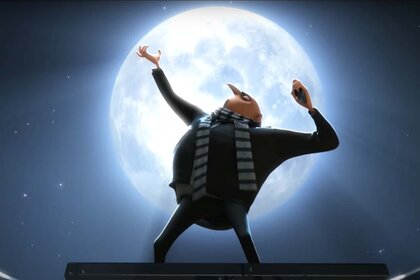 Gru (Steve Carrell) poses in front of the moon in Despicable Me (2010).