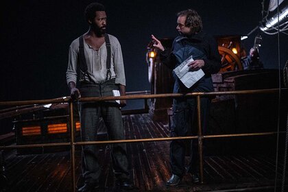 (from left) Corey Hawkins and director André Øvredal behind the scenes on the set of The Last Voyage of the Demeter (2023)