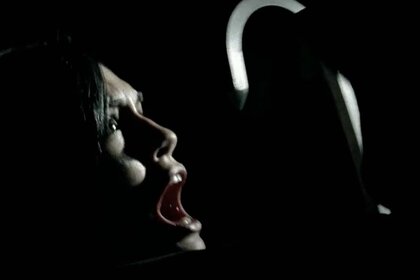 Zoe (Torrey DeVitto) screams as a large hook approaches her face in I'll Always Know What You Did Last Summer (2006).