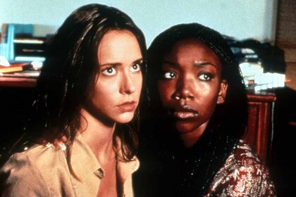 Jennifer Love Hewitt and Brandy holding on to one an other with fear in their eyes in I Still Know What You Did Last Summer (1998)