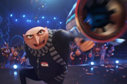 Gru (Steve Carrell) holds a weapon in Despicable Me 4 (2024).