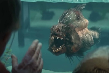 A piranha in a tank bares its teeth in Piranha 3D (2010).