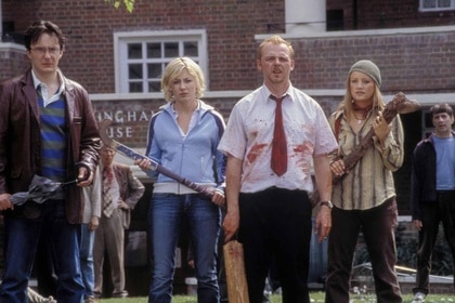 The cast of Shaun of the Dead (2004) hold weapons.