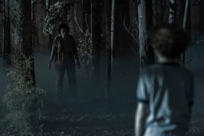 Arlo Chenoweth stares at a zombie in the woods on Teacup