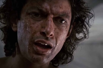 A mutated gross Seth Brundle (Jeff Goldblum) looks disgusted in The Fly (1986).