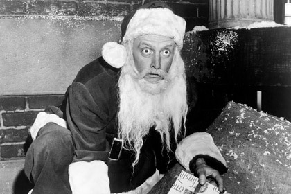 Santa (Art Carney) picks up a present and bugs his eyes out in The Twilight Zone Episode 211.