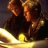 Amanda Tapping and Richard Dean Anderson looking at an alien body in Stargate SG-1