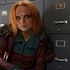 Irisa (Stephanie Leonidas) crouches near cabinets in Defiance Episode 111.