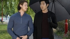 Todd Sleator (Aren Buchholz) and Mike Choi (Ryan Jinn) walk together outside on Reginald The Vampire Episode 206.