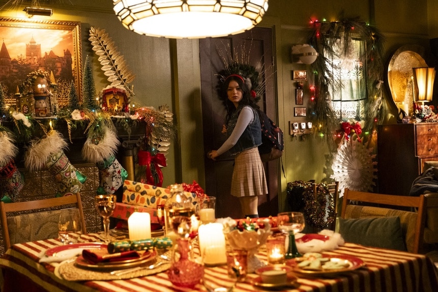 Claire (Thailey Roberge) looks at Christmas decorations on Reginald the Vampire Episode 207.