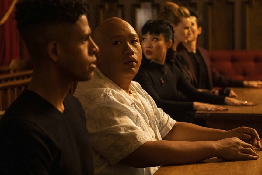 Maurice Miller (Mandela Van Peebles), Reginald Andres (Jacob Batalon), and Nikki (Christin Park) sit at a table in Reginald the Vampire Episode 209.