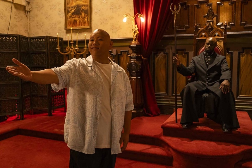 Reginald Andres (Jacob Batalon) holds an arm out as Bolestro (Garfield Wilson) watches in Reginald the Vampire Episode 209.