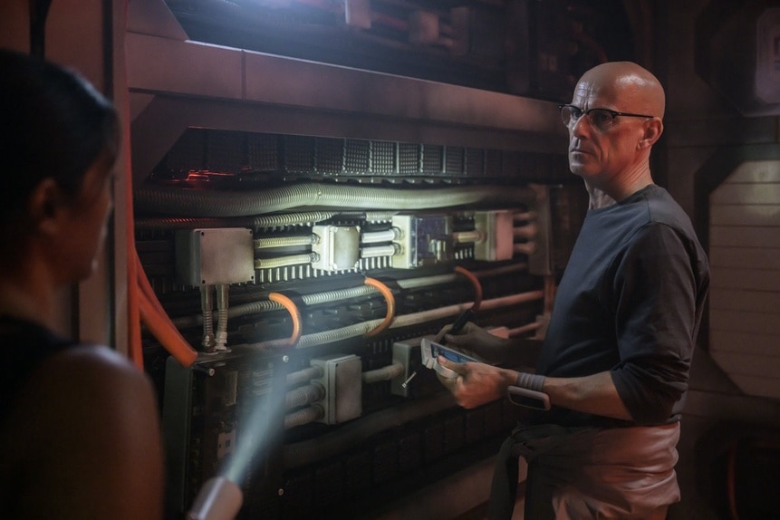 William Trust (Paul Leonard Murray) inspects hardware on The Ark Episode 203.