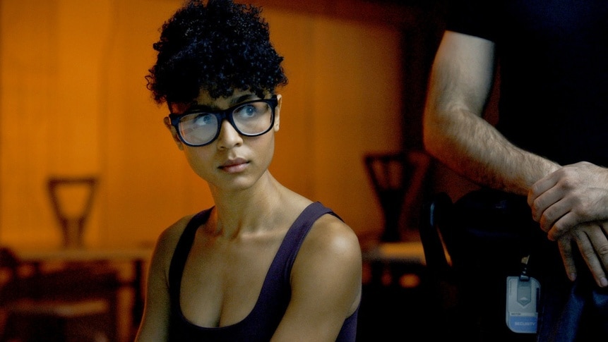 Alicia Nevins (Stacey Read) wears black glasses in The Ark Episode 202.