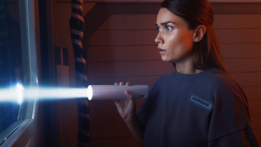 Eva Markovic (Tiana Upcheva) holds a flashlight in The Ark Episode 202.