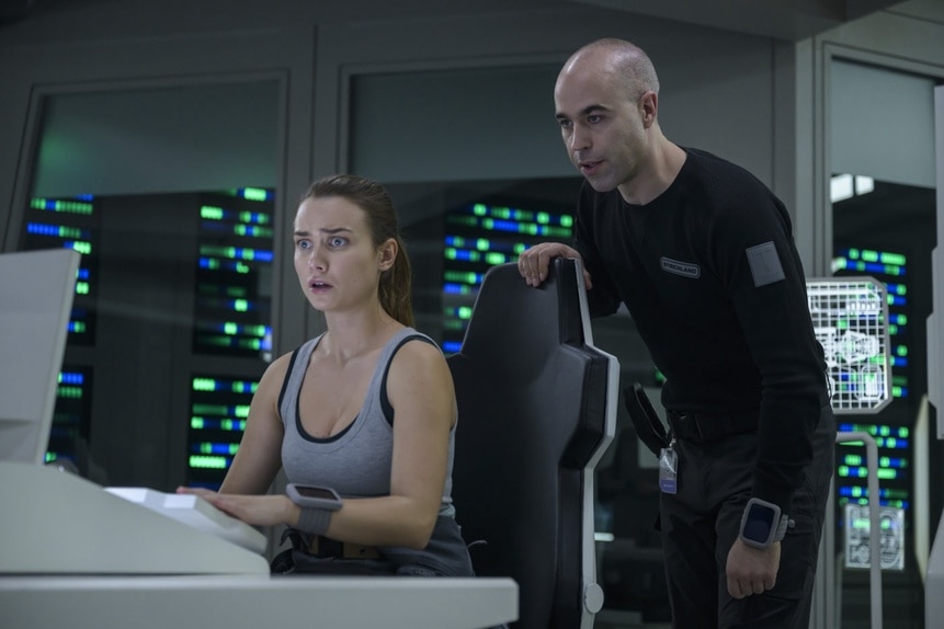 Eva Markovic (Tiana Upcheva) and Felix Strickland (Pavle Jerinic) look at a computer on The Ark Episode 211.