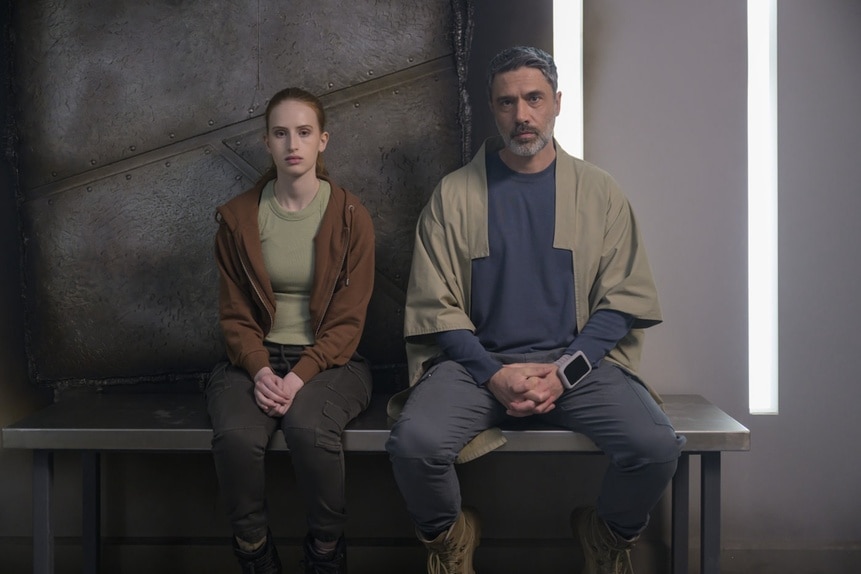 Kelly Fowler (Samantha Glassner) and Dr. Marsh (Jadran Malkovich) sit next to each other on The Ark Episode 212.