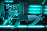 Mayor Ben Hawthorne (Levi Fiehler) floats next to a grey alien in a spaceship in Resident Alien Episode 302.