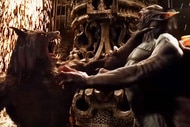 A werewolf grabs Dracula by the neck in Van Helsing (2004).