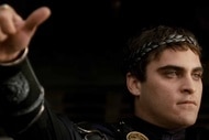 Commodus (Joaquin Phoenix) holds out his thumb in Gladiator (2000).