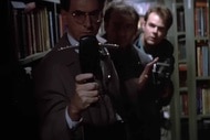 Egon Spengler (Harold Ramis) uses a PKE meter as Ray Stantz (Dan Aykroyd) and Dr. Peter Venkman (BIll Murray) follow him in Ghostbusters (1984).
