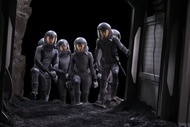 The cast wears full body spacesuits on The Ark Episode 206.