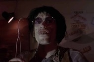 Chop-Top (Bill Moseley) holds a wire clothes hanger in The Texas Chainsaw Massacre 2 (1986).