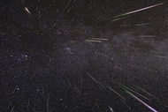 A meteor shower — in theis case, the Perseids — is usually composed of small bits material sloughed off a comet that burn up in our atmosphere. Credit: NASA/JPL