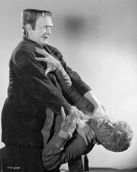 The monster (Bela Lugosi) chokes The Wolfman (Lon Chaney Jr.) in Frankenstein Meets the Wolfman (1943).