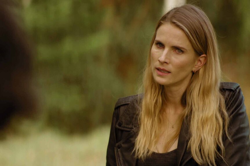 Helena appears outside in a black jacket in La Brea Episode 306.