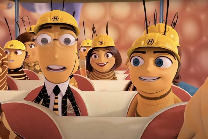 Adam Flayman (Matthew Broderick) and Barry B. Benson (Jerry Seinfeld) wear hardhats in the hive in Bee Movie (2007).