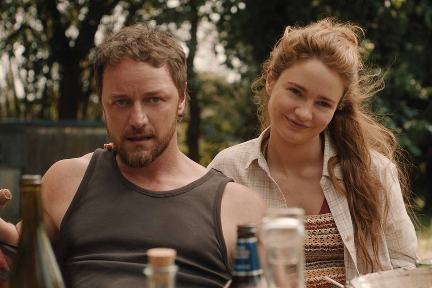 Paddy (James McAvoy) and Ciara (Aisling Franciosi) sit together in Speak No Evil (2024).