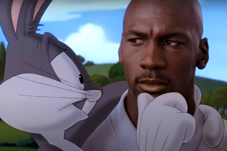 Michael Jordan holds Bugs Bunny in Space Jam (1996).