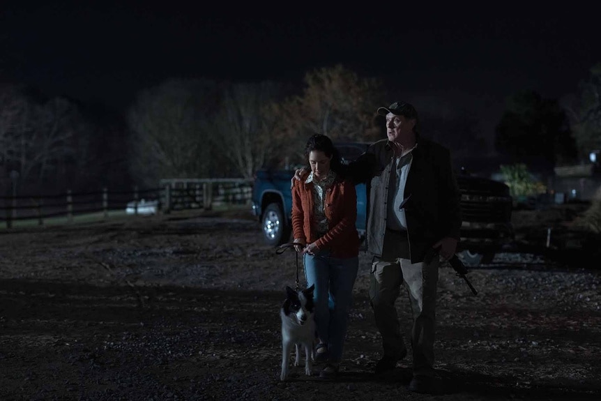 Claire Kelly (Holly A. Morris) and Donald Kelly (Boris McGiver) walk with a dog and a gun on Teacup Episode 102