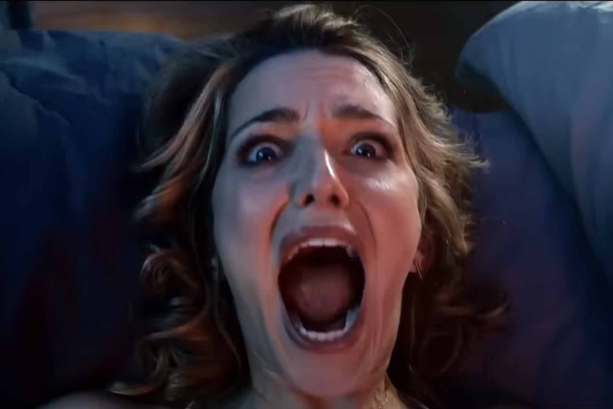 Tree Gelbman (Jessica Rothe) screams in Happy Death Day (2017).