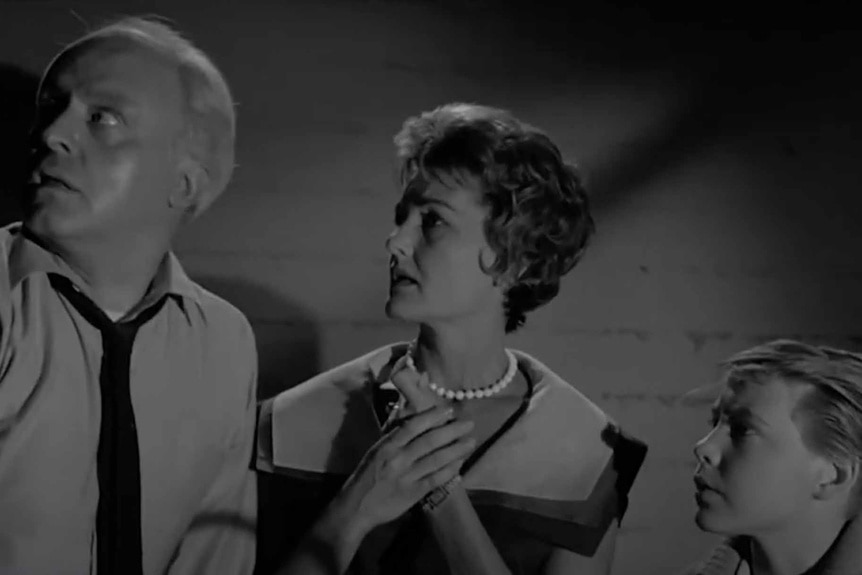 A family appears on The Twilight Zone Season 3 Episode 3 "The Shelter".