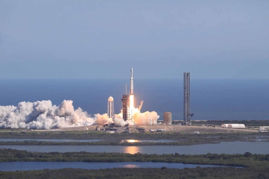 A SpaceX Falcon Heavy rocket carrying NASA’s Europa Clipper launches.