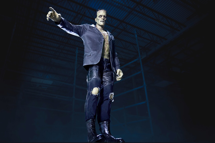 An Animatronic statue of Frankenstein's Monster pointing