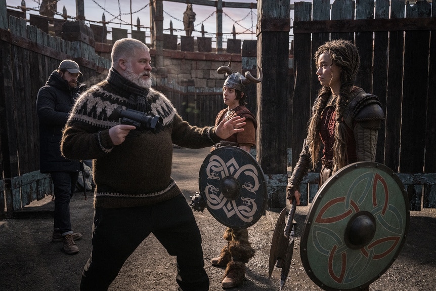 Dean DeBlois, Gabriel Howell and Nico Parker on the set of the live-action How to Train Your Dragon.