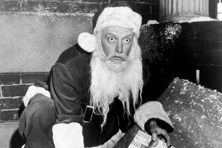 Santa (Art Carney) picks up a present and bugs his eyes out in The Twilight Zone Episode 211.